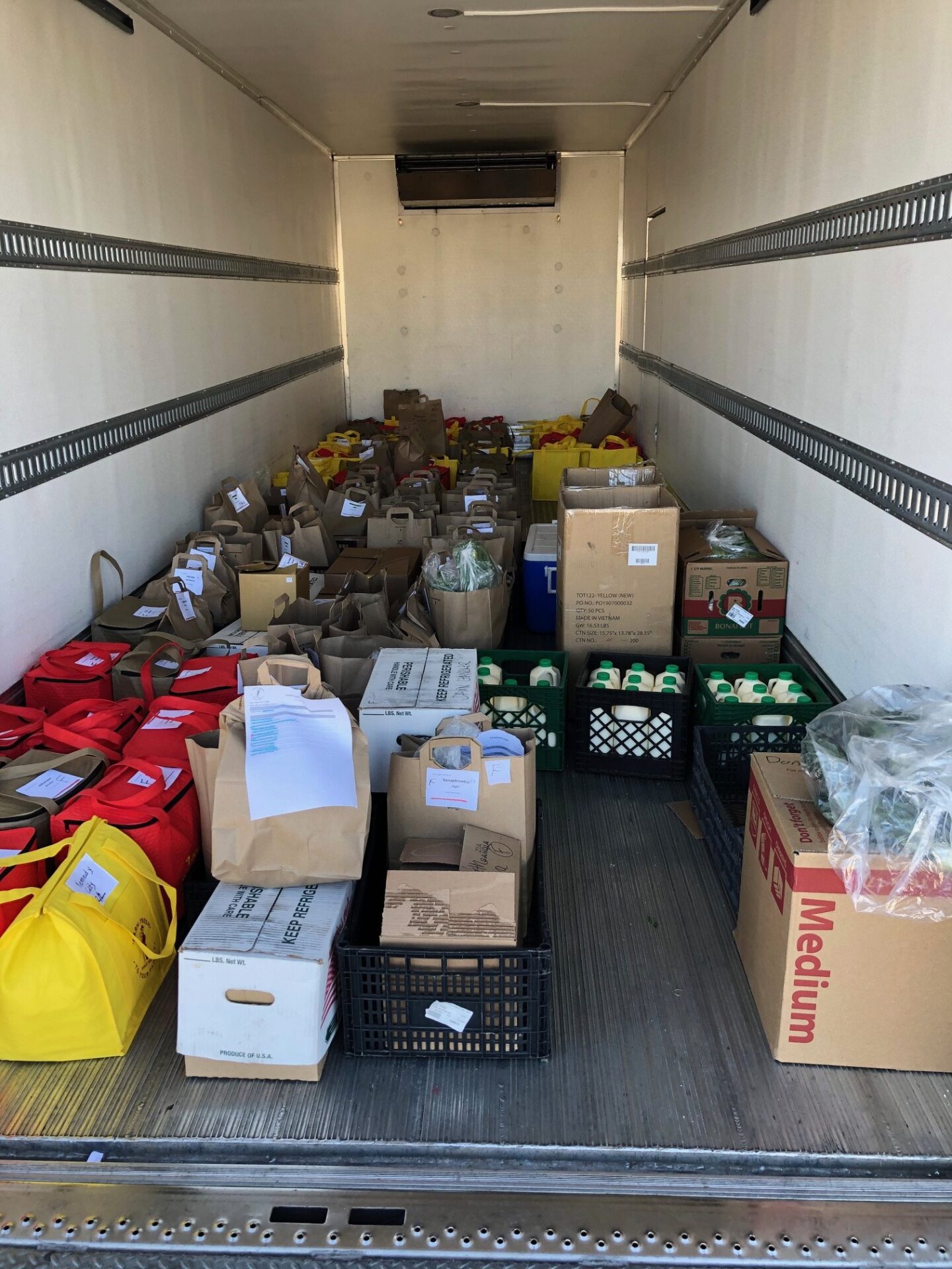 A photo of food bags in a truck