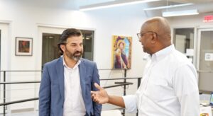 Two men conversing