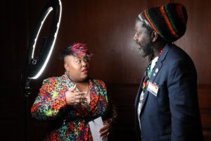 A woman and man talking