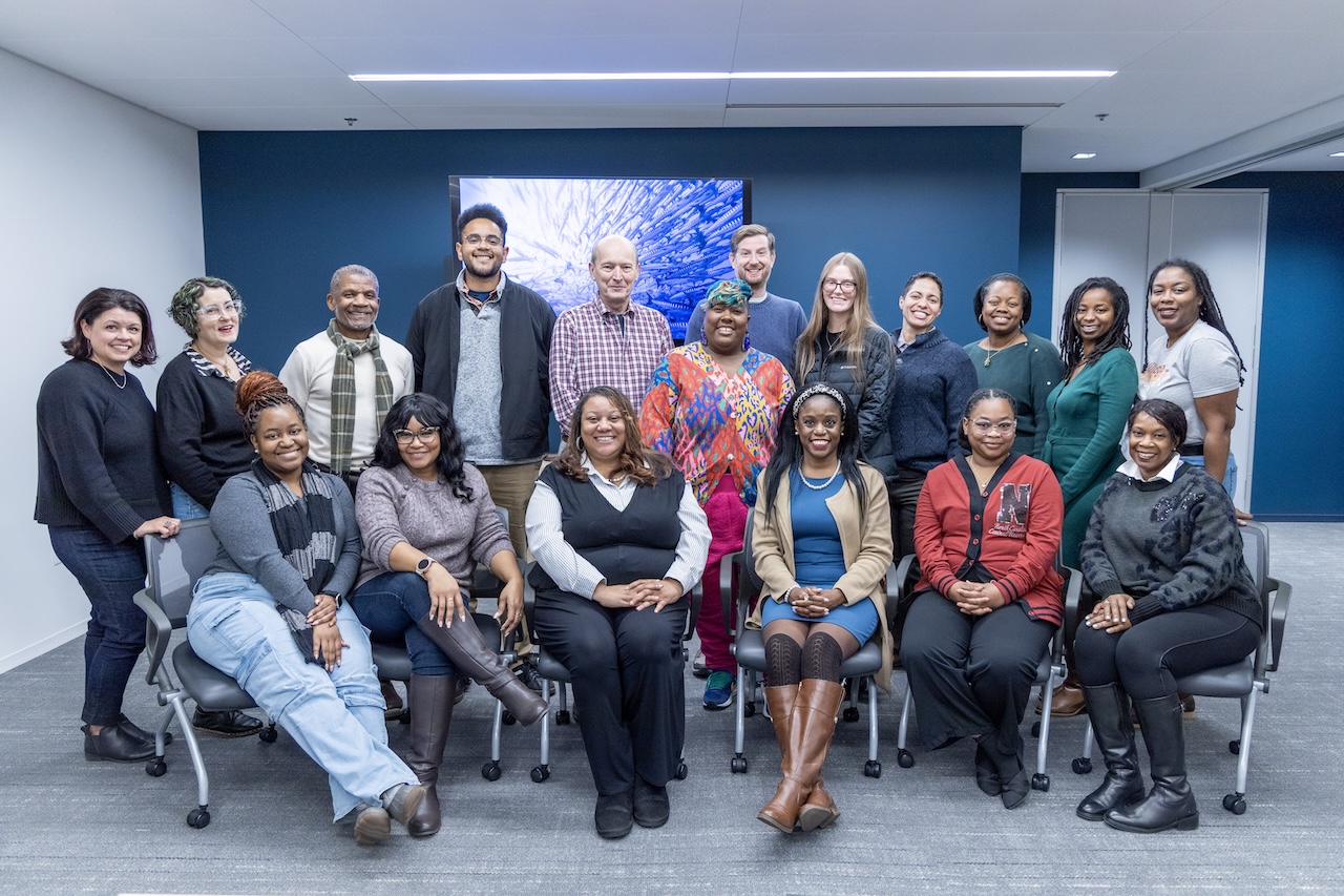 A group standing and seated together